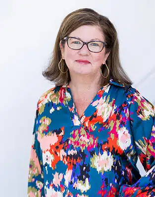 a woman looking at the camera